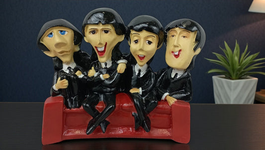 Figura decorativa The Beatles en sillón – Coleccionable icónico